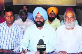 J&K State Teachers Association president Kulwant Singh addresses mediapersons in Jammu on Tuesday. 