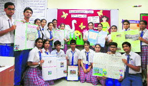 Students of DAV International School hold placards on the occasion of World Environment Day in Amritsar on Wednesday. 