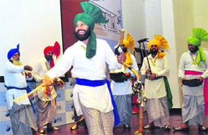 Artistes perform Malwai gidda during a state-level function on World Environment Day at the Indian School of Business in Mohali on Wednesday. 