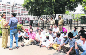 Members of PUSU protest outside the Vice-Chancellors office at Panjab University on Wednesday.