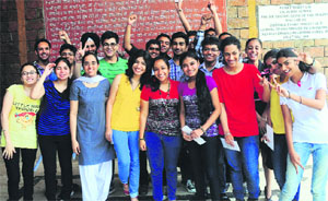 Students in a jubilant mood after receiving cash prizes during a felicitation ceremony at Sector 32 in Chandigarh on Wednesday