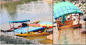 Two shikaras that are operational; and (right) another one in a deplorable condition at the Sukhna Lake in Chandigarh. 