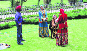 Artistes enact a scene during the shoot of televison serial CID in Mussoorie on Wednesday.