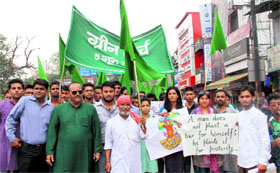 r Anil Joshi, founder of HESCO, leads a Green March on World Environment Day in Dehradun on Wednesday
