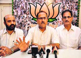 BJP national executive committee member Nirmal Singh addresses mediapersons in Jammu on Wednesday