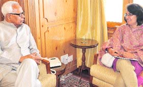 Governor NN Vohra with Navnita Chadha Behera, honorary director, Institute of Research on India and International Studies, in Srinagar on Wednesday
