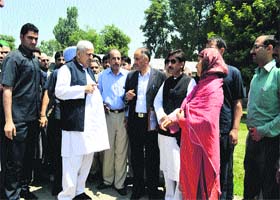 Peoples Democratic Party patron Mufti Mohammad Sayeed interacts with people in Anantnag district on Wednesday