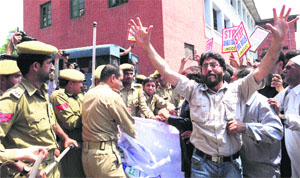 Contractors during a protest in Srinagar on Wednesday.