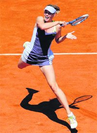 Maria Sharapova beat Jelena Jankovic to reach the semifinals.