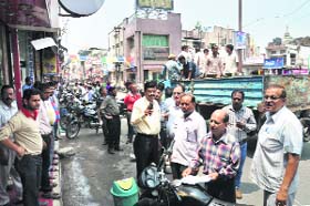 An anti-encroachment drive being carried out by Municipal Corporation staff a Paltan Bazaar, Dehradun, on Thursday