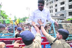 PRD jawans stage a demonstration in front of the Secretariat in support of their demands in Dehradun on Thursday