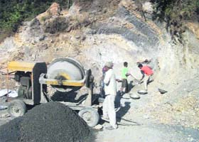 Gaping holes left by contractors in mountains on the Mackinnon Cart Road in Mussoorie during the widening the road