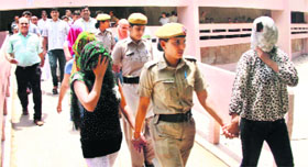 A group of boys and girls arrested from a pub in Gurgaon.