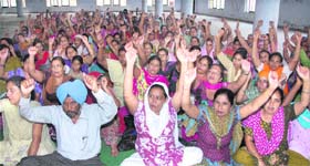 Members of the Sanjha Mulazam Morcha hold a protest in favour of employees rights at a protest rally in Jalandhar on Thursday