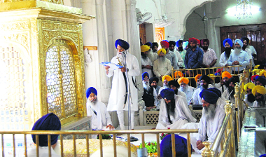 Akal Takht chief Jathedar Gurbachan Singh reads out a message for the community at the Golden Temple on Thursday. 