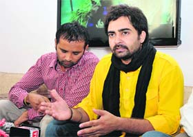 Singer-turned-actor Sharry Mann speaks to mediapersons during his visit to Bathinda to promote his upcoming movie Oye Hoye Love Ho Gaya, on Friday