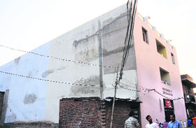 The building that was sealed by the Land Acquisition Collector in Hallo Majra on Friday.