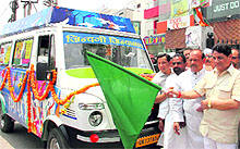 Health Minister Surender Singh Negi flags off a publicity-cum-awareness van on AIDS and TB in Dehradun on friday