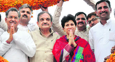 (From right) Union Minister for Social Justice and Empowerment Selja, All-India Congress Committee general secretary Chaudhary Birender Singh and Rajya Sabha member Ishwar Singh are felicitated during a 'Dalit awareness sammelan' in Karnal on Friday.