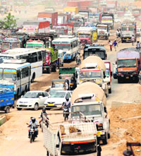Residents from Nakhraula, Rampura and other villages block traffic on the National Highway No. 1 after the death of a person in an accident near Gurgaon on Friday