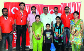 Vodafone officials with the winners of a painting competition on to mark World Environment Day in Jammu on Friday.