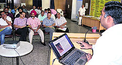 District epidemiologist Dr Puneet Juneja addresses a workshop on dengue and malaria in Ludhiana on Friday