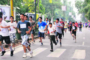 Youths participate in a marathon organised by MAD on its second anniversay in Dehradun on Saturday. 