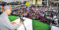 Chief Minister Virbhadra Singh addresses an election meeting in Sundernagar on Friday evening