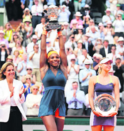 Serena Williams beat Maria Sharapova 6-4 6-4 in the final to win the French Open in Paris on Saturday. 