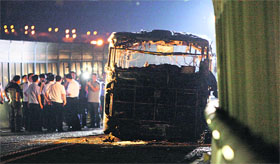 The burnt bus in Xiamen city in China on Friday.