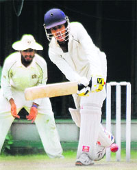 A batsman plays a shot during a match for the Dhruv Pandove Trophy at the PCA Stadium in Mohali on Sunday