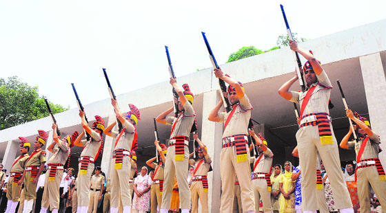 The Chandigarh Police personnel give a gun salute to Inspector Sucha Singh at the cremation ground in Sector 25, Chandigarh, on Sunday. 