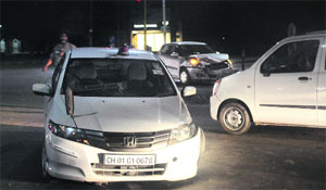 Judges car, along with the car it collided with at the Housing Board light point on Sunday. 