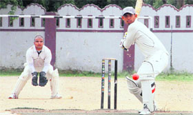 A batsman plays a shot during a match in the 2nd Rattan Chand Memorial Cricket Tournament at Survey Stadium in Dehradun on Sunday.