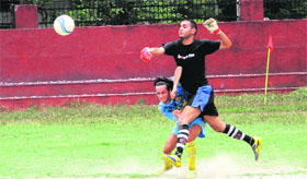 Players in action during a match in the BS Negi Memorial Football Tournament at Ambedkar stadium, ONGC, in Dehradun on Sunday.