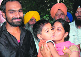 Happy reunion: Gurmilap Singh with his parents in Amritsar on Sunday.