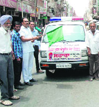 The ambulance of the NGO Sahara Jan Sewa meant for aiding heatstroke victims being flagged off in Bathinda on Monday.