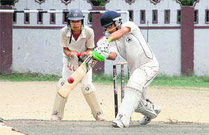 A batsman in action during a match in the Second Rattan Chand Memorial Cricket Tournament in Dehradun on Monday. 