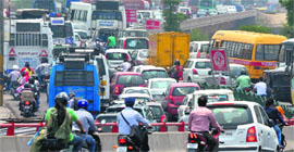 Traffic came to a standstill due to a jam on Janipur to Gandhi Nagar route in Jammu on Monday.