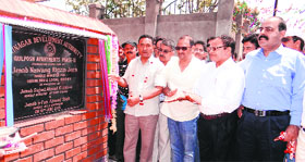 Urban Development and Local Bodies Minister Nawang Rigzin Jora lays the foundation stone of Gulposh Apartments at Bemina in Srinagar on Monday.