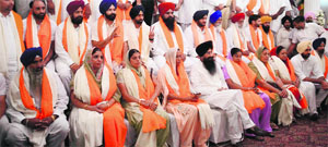 PWD Minister Sharanjit Singh Dhillon with zila parishad/block samiti members during a programme organised to honour the members in Ludhiana on Monday.