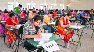 Students take an entrance test at the PAU in Ludhiana on Monday. 