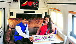 Customers experience the feel of luxury inside a caravan