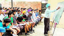 Aspirants for armed forces being trained at the District Sainik Welfare Board office in Amritsar