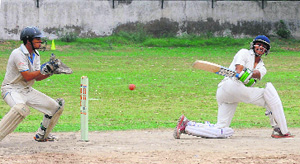 A batsman plays a shot during Chaudhary Bansi Lal Memorial Cricket Tournament in Sector 19, Chandigarh, on Tuesday. Tribune Photo: Manoj Mahajan