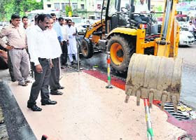 An anti-encroachment drive under way on East Canal Road in Dehradun on Tuesday