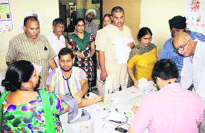 As PCMS doctors resume work, patients make a beeline to get themselves examined in Jalandhar on Tuesday.