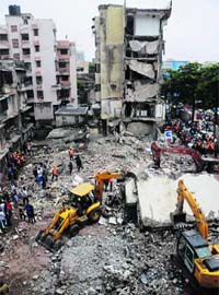 Rescue work in progress after the collapse of a building at Mahim in Mumbai on Tuesday
