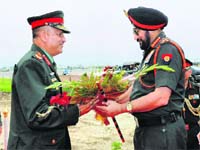Nepalese Army Chief General SJB Rana receives his Indian counterpart General Bikram Singh in Kathmandu, Nepal, on Monday