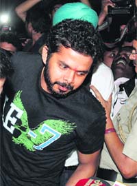 Cricketer S Sreesanth arrives to brief the media after being released on bail in the IPL fixing case, in New Delhi on Tuesday